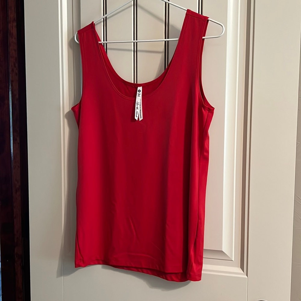 Leo & Nicole, pretty red tank top. Soft and silky 93% Nylon and 3% Spandex.